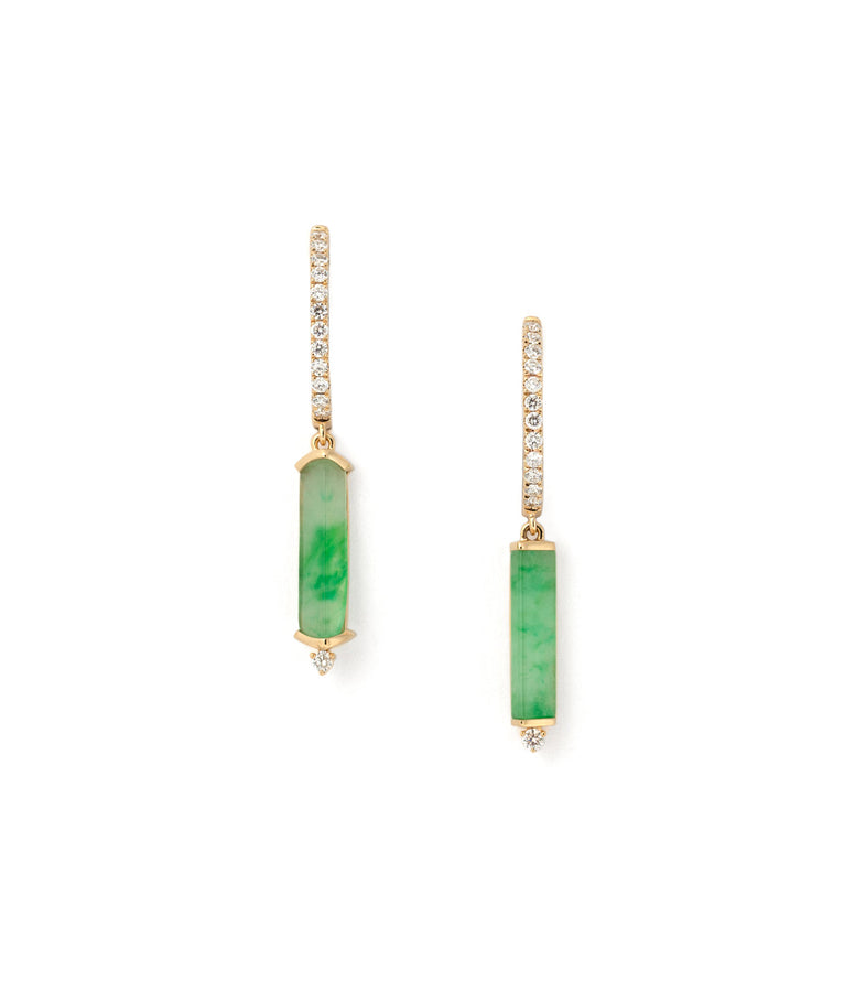 This picture shows one pair of earrings. The earrings are in 18K yellow gold, there is a hoop with diamonds and underneath the hoop is a dangling thin elongated jadeite with a diamond at its bottom